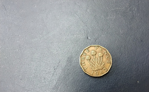 British threepence coin - a,