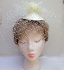 Ivory White Wedding Fascinator with Birdcage Style Veil
