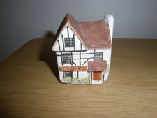 Vintage mini ceramic house ornmament. 'Antiques''Philip Laureston 708' (D36a)