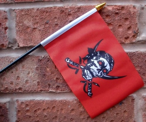 Red pirate skull hand waving - hand,
