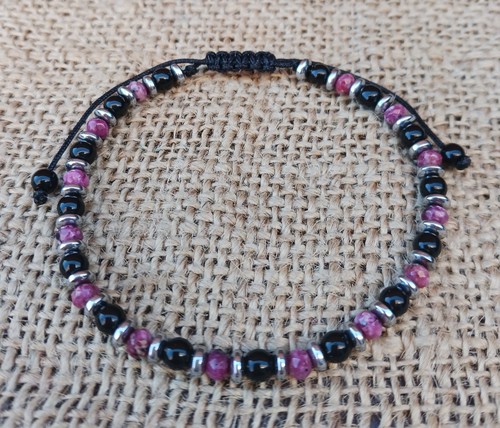 Faceted black spot garnet - faceted,