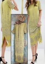 Asos yellow gold silver tassel