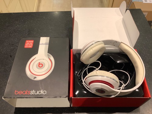 Beats ear headphones - on, ~