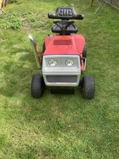 Red 1965 MTD Lawnflite ride on mower no deck ( Tow bar Attached)