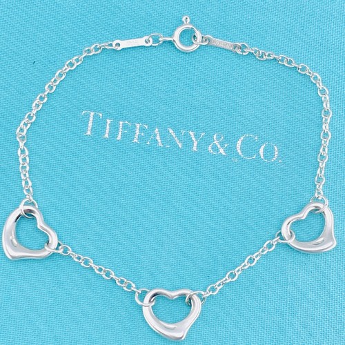 Tiffany triple open - &,