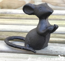 Cast iron mouse ornament in a