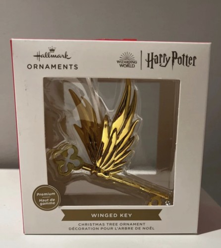 Hallmark gold winged key from - winged,