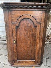 Antque oak corner cabinet single door