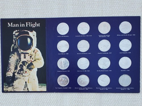 Shell man flight coin - shell, in