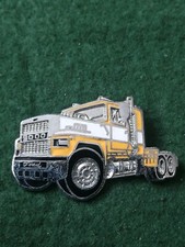 Old Enamel Ford 9000 Truck Badge. 