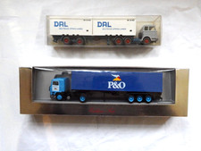 Two 1/87 scale model trucks with P&O 40' container two DAL 20' containers.