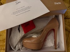 CHRISTIAN LOUBOUTIN NUDE