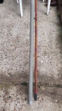 A Vintage, Beach Caster Fishing Rod . With Bag. 13’9”.