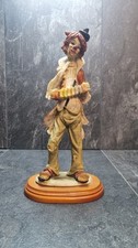 Vintage Pucci Arnart Hobo Clown figurine playing an accordion 10"