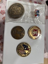 Lot of 4 Military Challenge Coins and 1 flag pin.