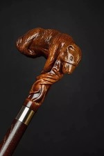 wooden walking stick hand