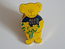 Marie Curie pin badge Daffodil