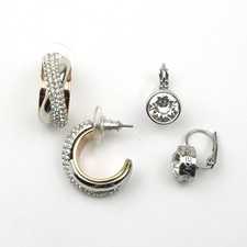 Swarovski swan mark hoop earrings and Dyrberg Kern silver tone 'Louise' earrings