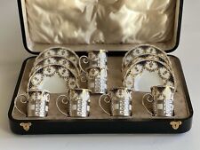 Antique Aynsley  cased set of 6 coffee cups and saucers with silver cup holders