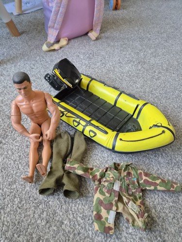 Action man with yellow dingy - with,