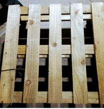 Industrial reclaimed wood pallet coffee table on Wheels treated for all weather 