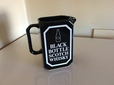 Black bottle scotch whisky - black,