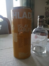 Empty Whisky Bottle And Tin, Bruichladdich