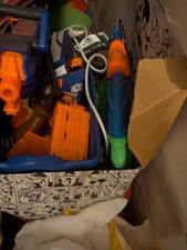 Bundle including Nerf Gun,  nerf bullets, water gun and other guns... FULL BOX