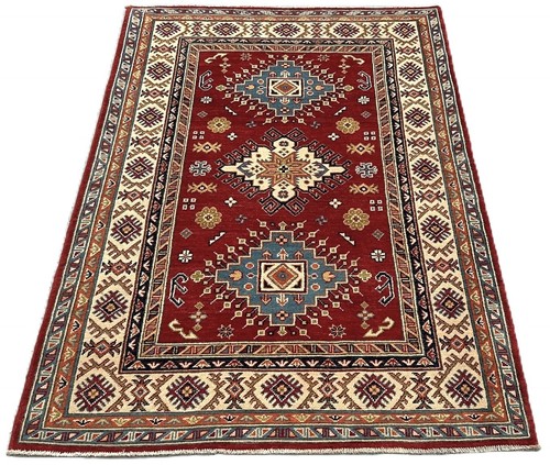 Hand knotted afghan - hand,