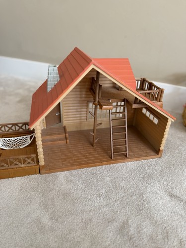 Sylvanian families log cabin - families,