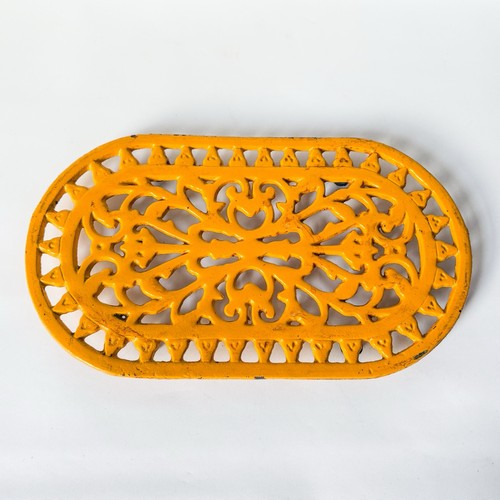 Yellow cast iron trivet - yellow,
