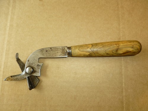 Antique star wheel can opener - star,