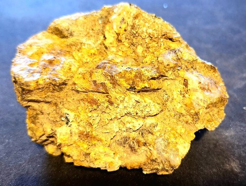 Gold ore specimen black - ore, hills