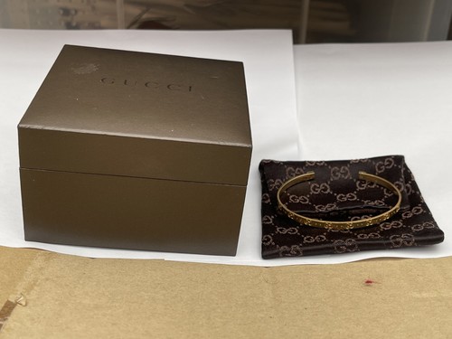 100 genuine gucci 18ct - 100%,