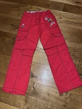 Girls red adjustable combat trousers age 8-9