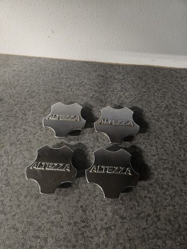 Toyota altezza center caps - center,