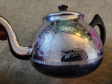Vintage "The Carlton" teapot by Swan Brand made of polished aluminium