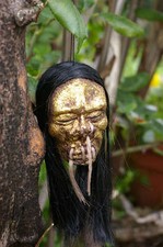 LONG HAIRED GOLD FACE SHRUNKEN HEAD MIRROR DANGLE 50s 