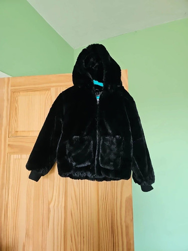 Age girls furry black coat - 7-8,