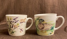 SET OF 2 PORCELAIN HAND