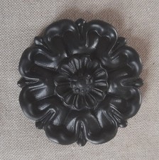 A 7.4cm black resin not oak
