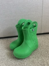 CROCS green handle it rain