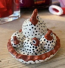 Nest of Cute Speckled Hens