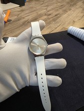 Swatch Skin Irony Skindoree  watch with a silver-tone dial white silicone strap