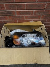 RIGHT  & LEFT TYC 20-0065-15-2 Headlight for FORD