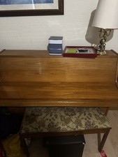 Upright Playing  Piano