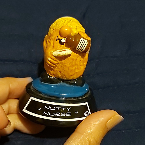 Small resin painted nurse - small,