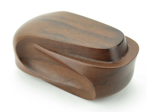 Exquisite carved walnut treen