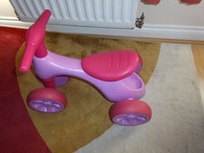 Violet Baby Balance Bike with Toy Storage - Safe 4-Wheel Toddler Trainer