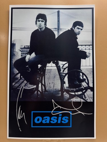 Signed oasis 11x17 band poster - signed,